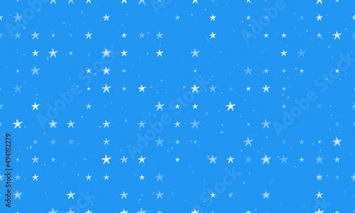 Seamless background pattern of evenly spaced white starfish symbols of different sizes and opacity. Vector illustration on blue background with stars