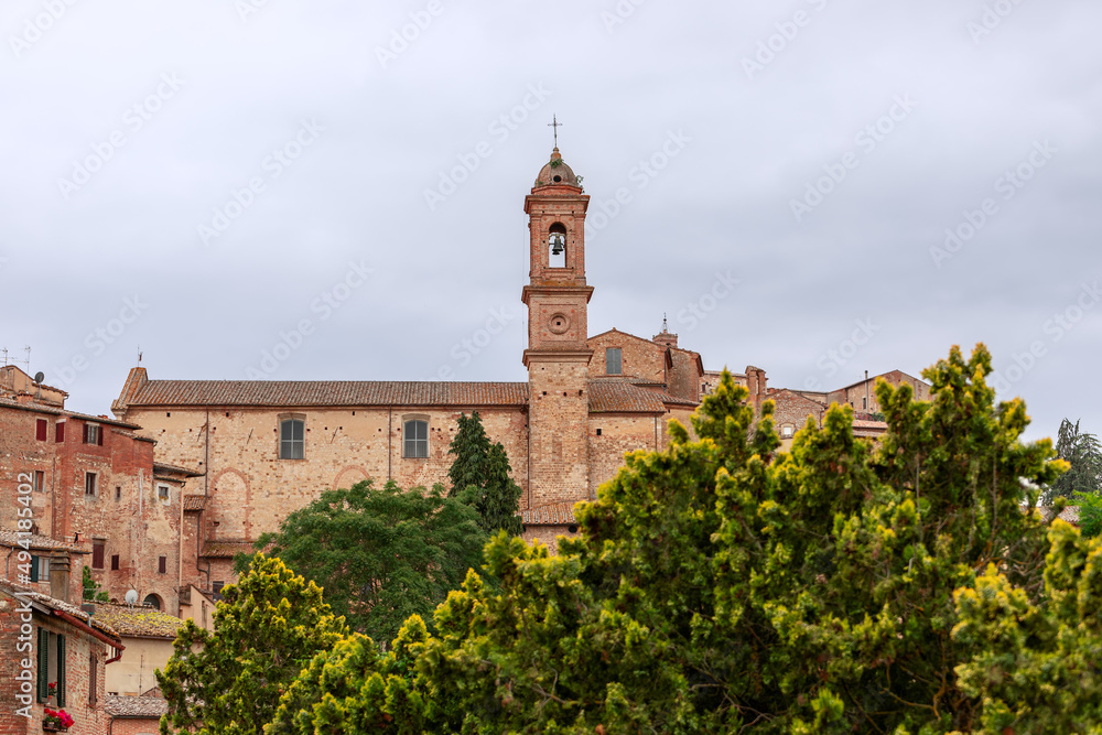 A close view to the bell-tower of Sant Agnese Church and Parish  in Montepulciano town, Italy