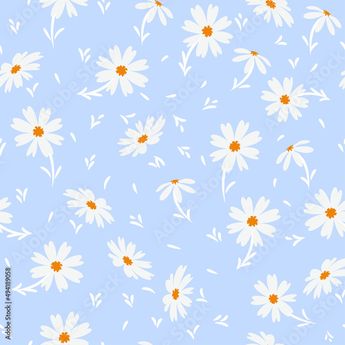 White doodle chamomile or daisy flowers isolated on blue background. Hand drawn floral seamless pattern vector illustration. Great for textile, paper, gift wrap and more.