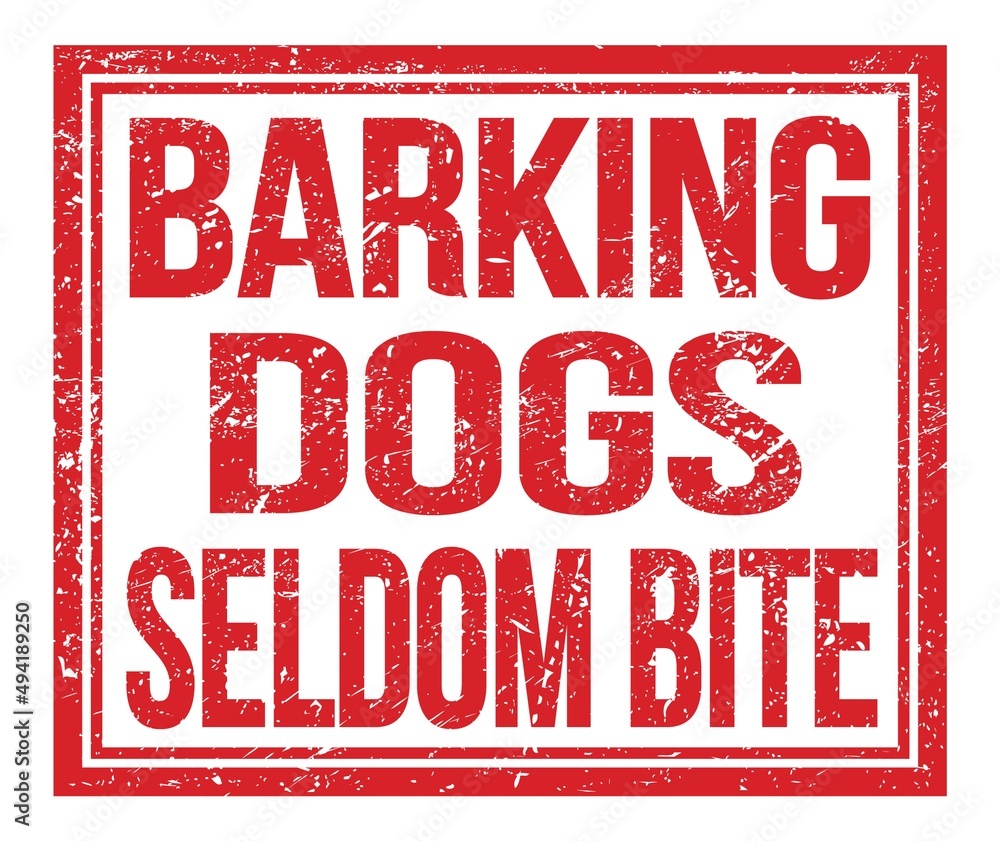 BARKING DOGS SELDOM BITE, text on red grungy stamp sign BARKING DOGS SELDOM BITE, text on red grungy stamp sign