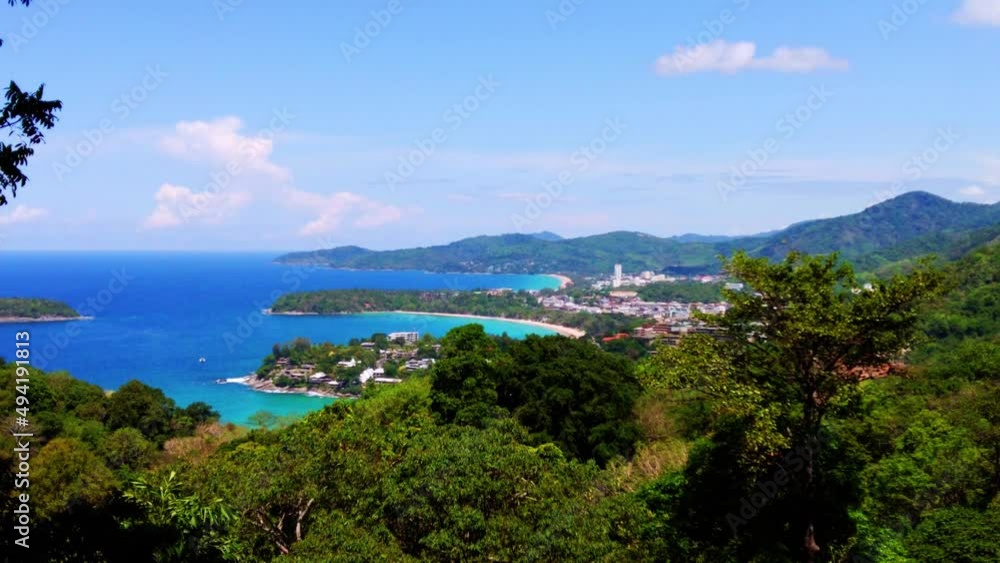 Kata Beach, Kata Noi beach Phuket  with beautiful blues and Greens, turquoise oceans islands mountains boats trees and beautiful resort island of phuket thailand