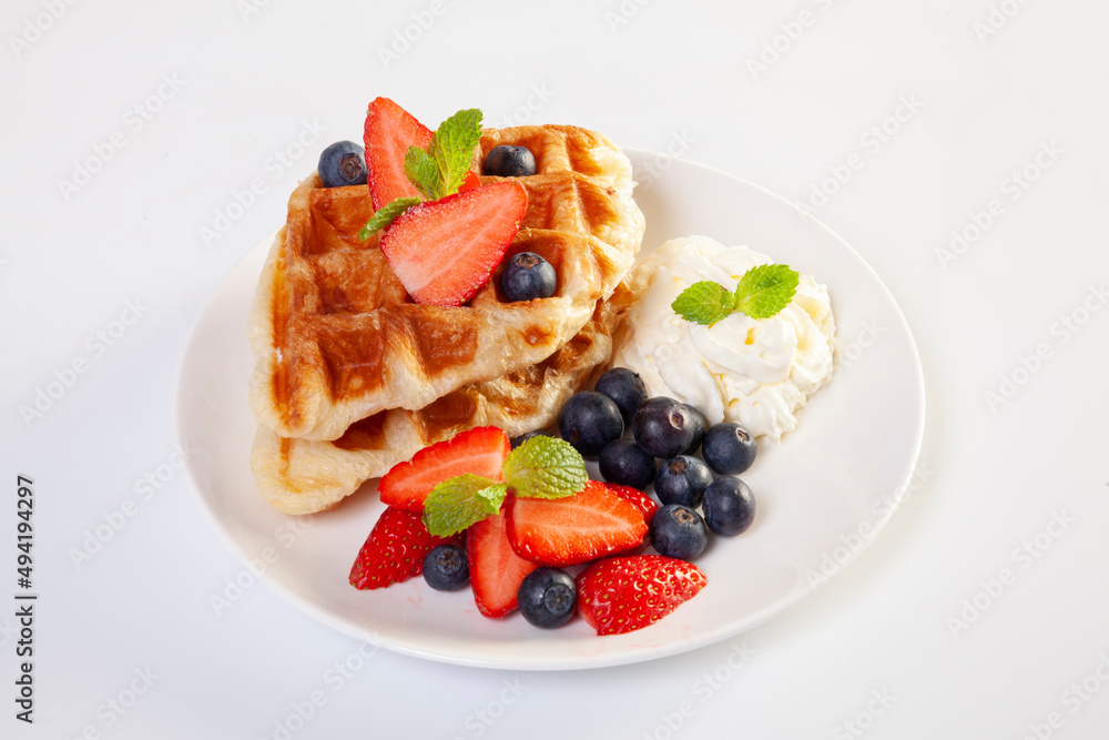   Waffles with berries and fruit. Healthy sweet summer breakfast