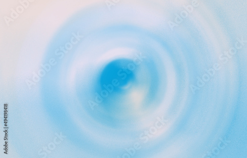 Shiny light blue swirl abstract background. Concentric circles around central point. FlashLight. Designer background. Abstract Background Of Spin Circle Radial Motion Blur