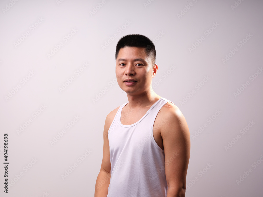 A man in a white vest A man in a white vest