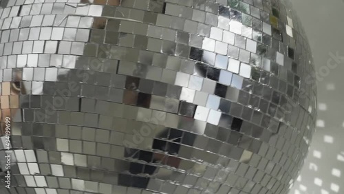 Close-up of spinning glitter disco ball Video HD