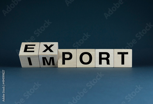 Cubes form words Export - Import. Concept of business, logistics and delivery