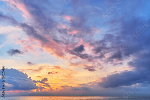 Landscape of peaceful calm sky wallpaper with fluffy clouds and sea © Goffkein