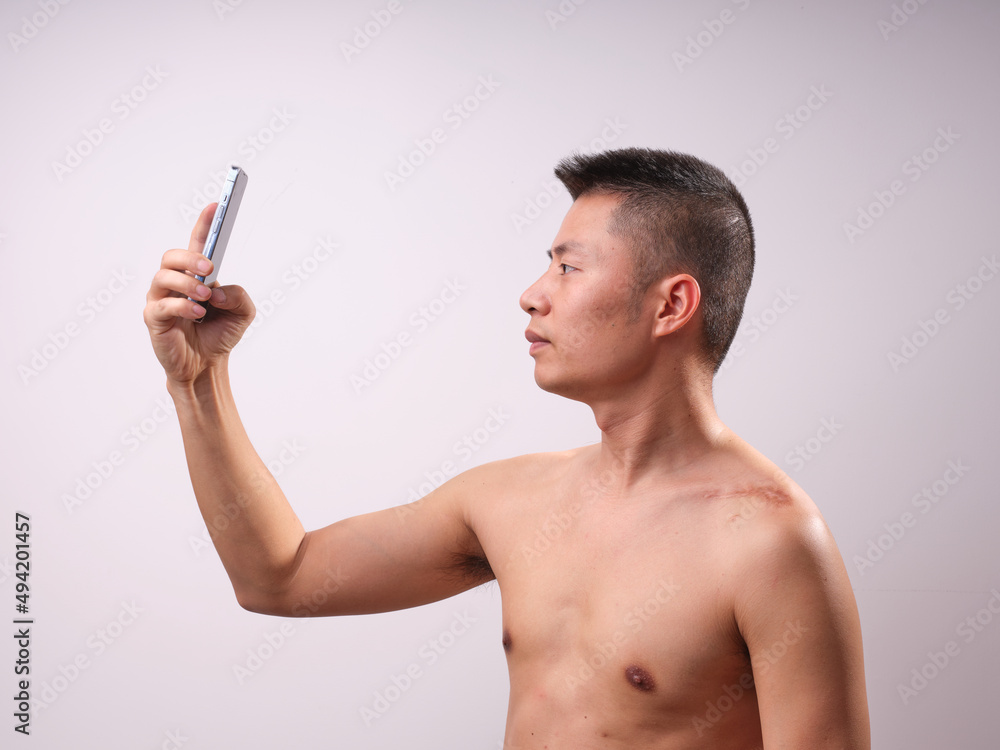 Fototapeta premium A man with a naked upper body