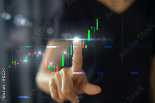 Business growth, progress or success concept. Trader is showing a growing virtual hologram stock, invest in trading. planning and strategy, Stock market.
