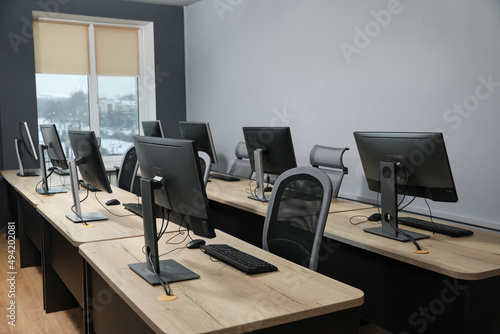 Many modern computers in open space office
