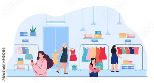 Female customers looking at clothes in retail store. Women buying garments or apparel in clothing shop flat vector illustration. Fashion, shopping concept for banner, website design or landing page