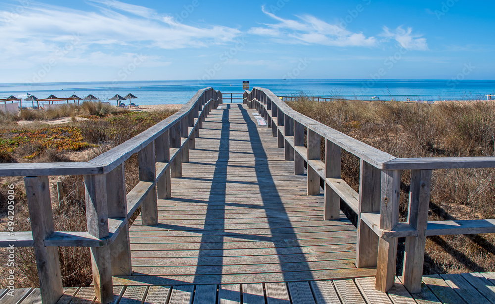 long wooden walk to the beach