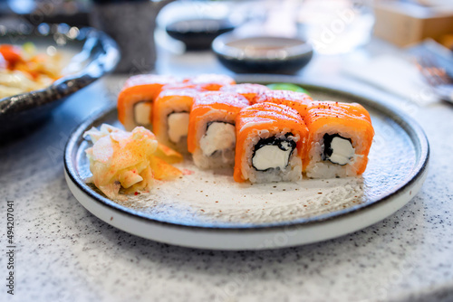 japanese philadelphia rolls with salmon on a plate