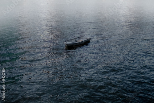 Lonely Boat on Water