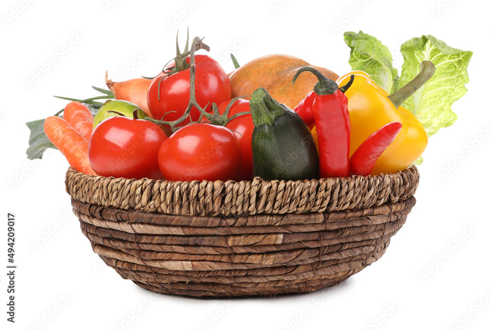 Fresh ripe vegetables and fruit in wicker bowl on white background Fresh ripe vegetables and fruit in wicker bowl on white background