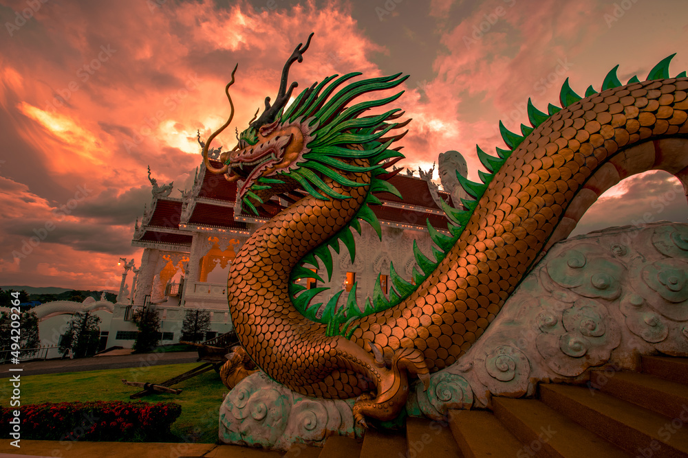 Fototapeta premium Background Chiang Rai Blue Temple or Wat Rong Seua Ten is located in Rong Suea Ten in the district of Rimkok a few kilometers outside Chiang Rai,Thailand