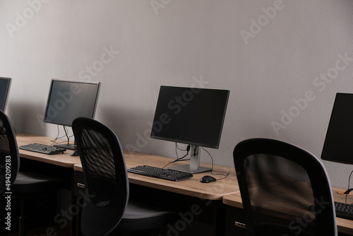 Many modern computers in open space office