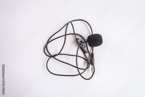 black clip on mic with 3.5mm jack TRS type, isolated on white background
