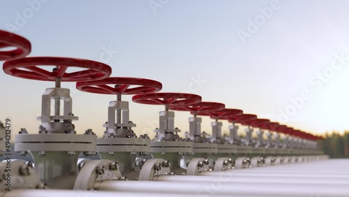 Oil, Gas Or Water Transportation With Pipe Line Valves On Grass. photo