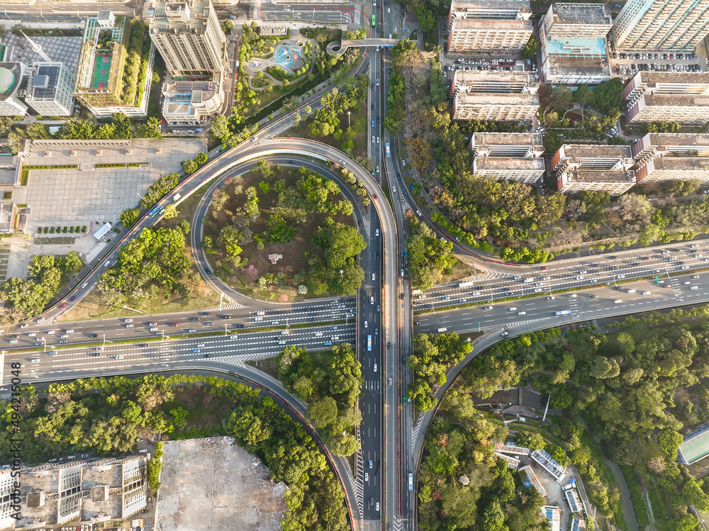 aerial view of urban traffic on overpass in Shenzhen at daytime,China. aerial view of urban traffic on overpass in Shenzhen at daytime,China.