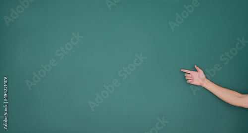 Hand point at the blank of blackboard