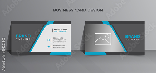Modern and corporate business card print template design in blue color