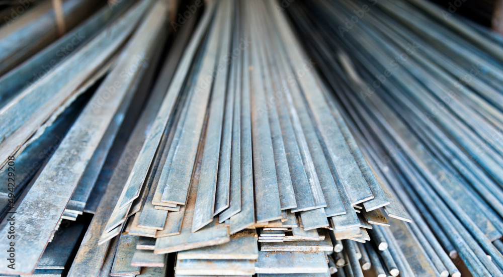 Piles of steel sheet in warehouse