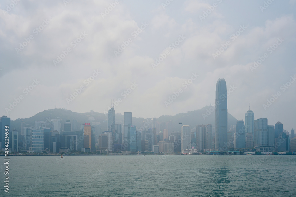 Victoria Harbor in Hong Kong at a misty spring day