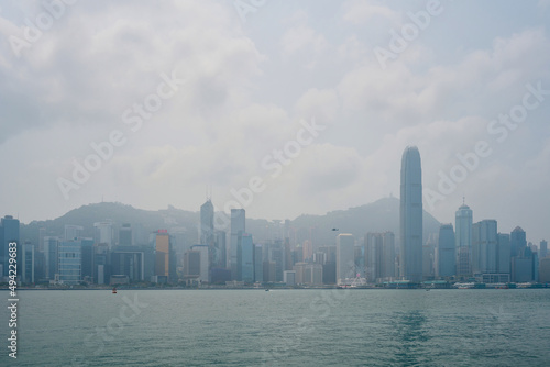 Victoria Harbor in Hong Kong at a misty spring day © LapTak