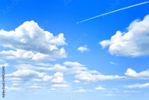 雲のある青空に飛行機雲の飛ぶ美しい初夏フレーム背景素材