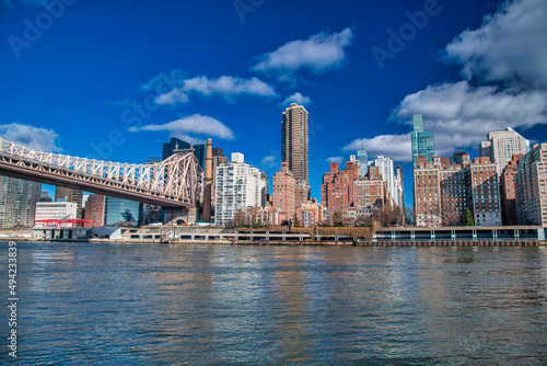 Midtown Manhattan skyline as seen from Roosevelt Island on a sunny day, New York City. photo