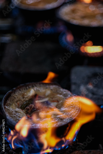 Clay Pot "Mee Kari " or curry noodles with flavorful cooked Ingredients. Usually eat with fishball and fishcake. Image is a selective focus
