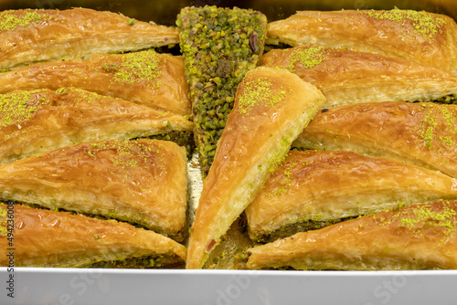 Carrot slice baklava dessert with pistachio. Mediterranean cuisine delicacies. Close-up baklava. local name havuc dilim baklava photo