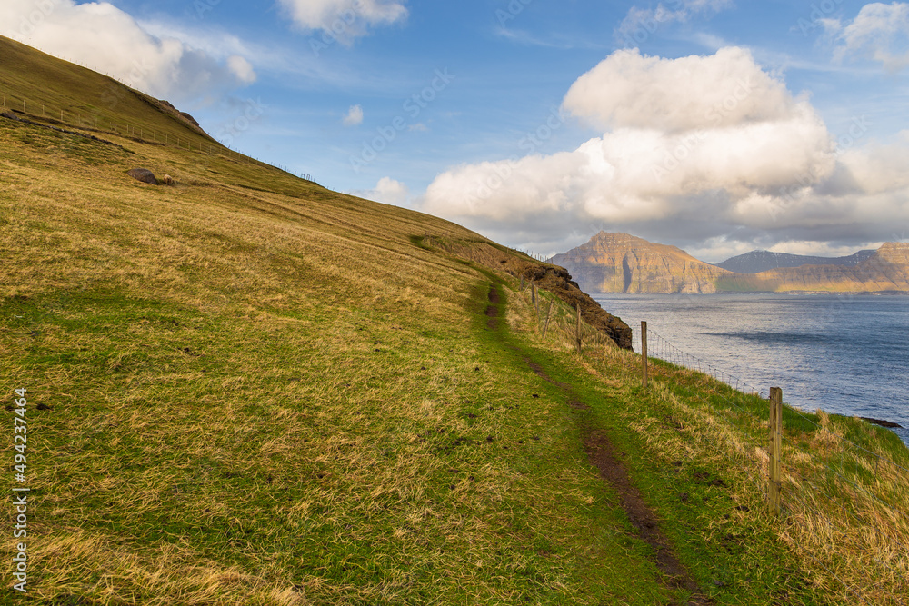 Sunset over a volcanic archipelago, Faroe Islands. Sunset over a volcanic archipelago, Faroe Islands.
