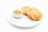 fried puri or Poori or luchi with sauce isolate on white background