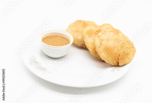 fried puri or Poori or luchi with sauce isolate on white background