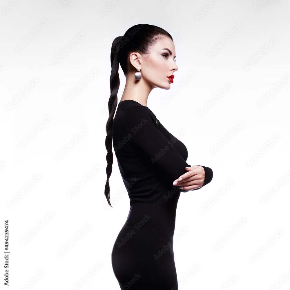 Fashion art studio portrait of elegant woman in geometric white background. Fashion art studio portrait of elegant woman in geometric white background.
