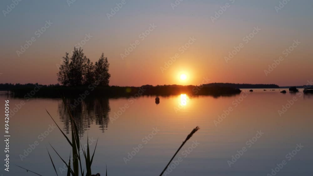 Stunning sunrise reflected on lake in Vaasa, Finland Stunning sunrise reflected on lake in Vaasa, Finland