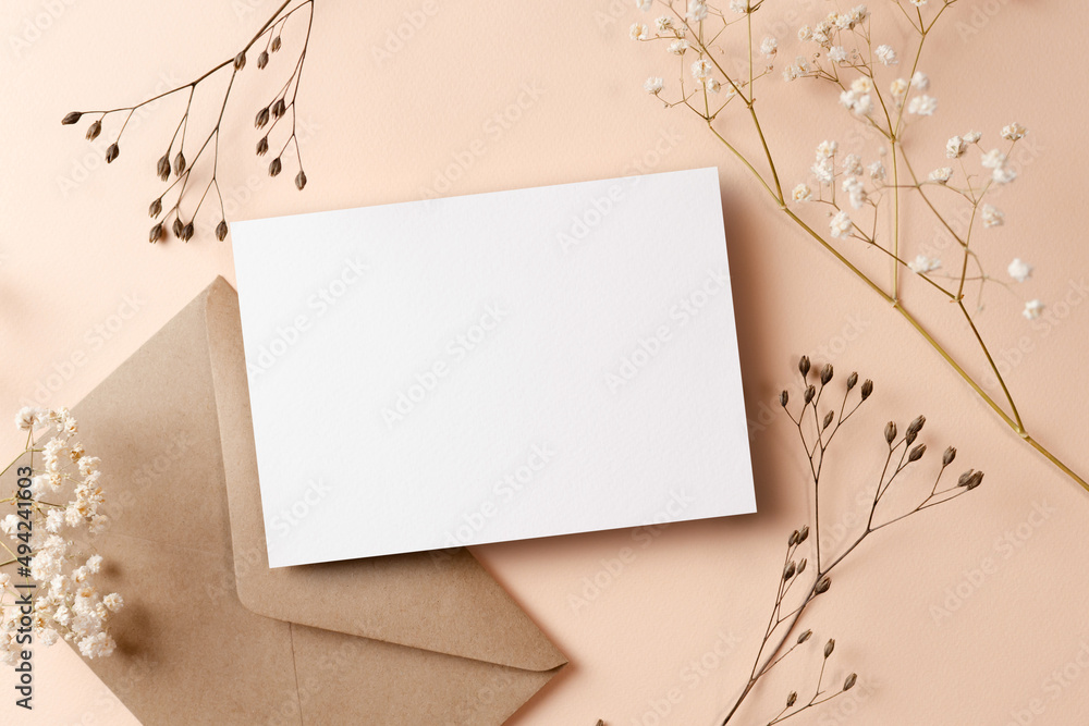 Wedding invitation or greeting card mockup with envelope and dry nature plants twigs Wedding invitation or greeting card mockup with envelope and dry nature plants twigs