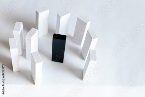 top view of rectangular black and white blocks on light background.