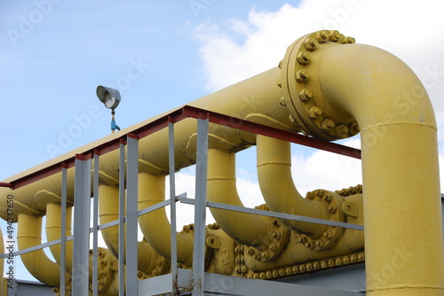 Gas transportation system. Booster pumping station for gas. Gas filling station and gas tanks. Transportation of gas around the world. Oil and gas sector. Gas turbines.