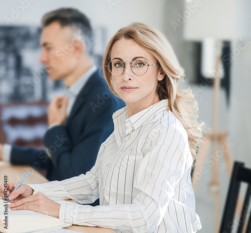 Man and woman working together in the offcie photo