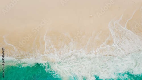 Aerial view of turquoise water and very beautiful white sand.