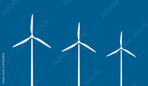 Offshore wind turbines / windmills on dark blue water in the ocean next to each other.