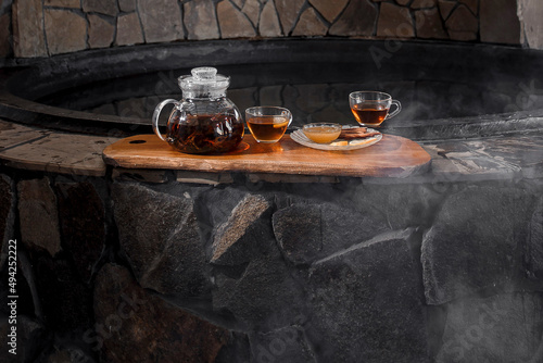 teapot with tea
cups of tea