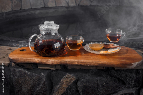 teapot with tea
cups of tea