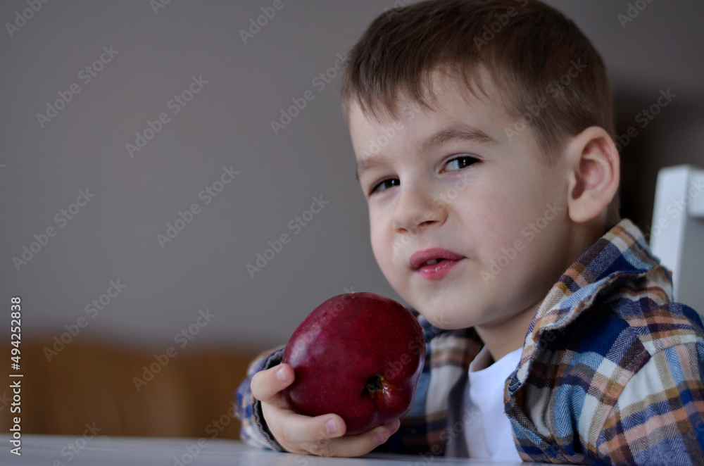 boy eating an apple boy eating an apple
