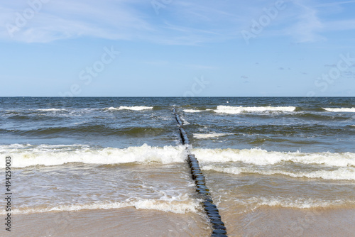 Waves on the beach of Zempin on the island of Usedom on a beautiful day