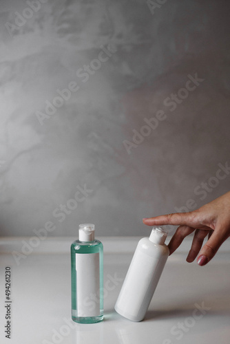 hand with bottle