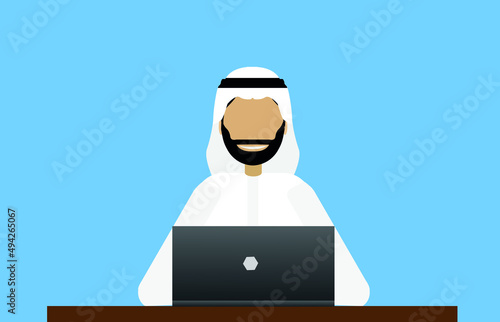 Arabic businessman using laptop on office table